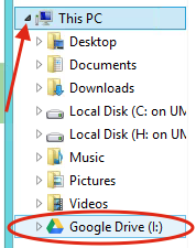 Red arrow pointing to "This PC" dropdown menu to reveal Google Drive saving option